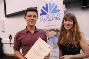 Liam Innis, receiving his award from ALL's Past President, Rachel Hawkes at the Routes into Languages Spelling Bee Final
